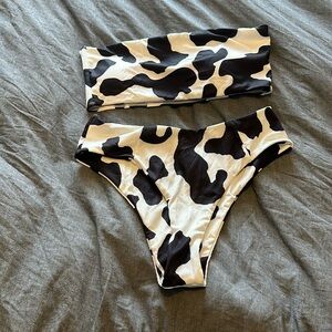Women’s 2 piece, cow print bandeau bikini.